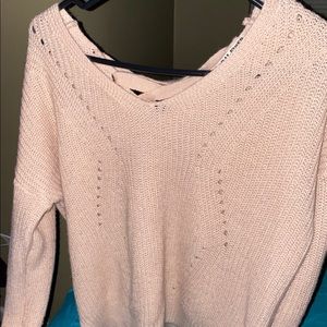a v-neck sweater